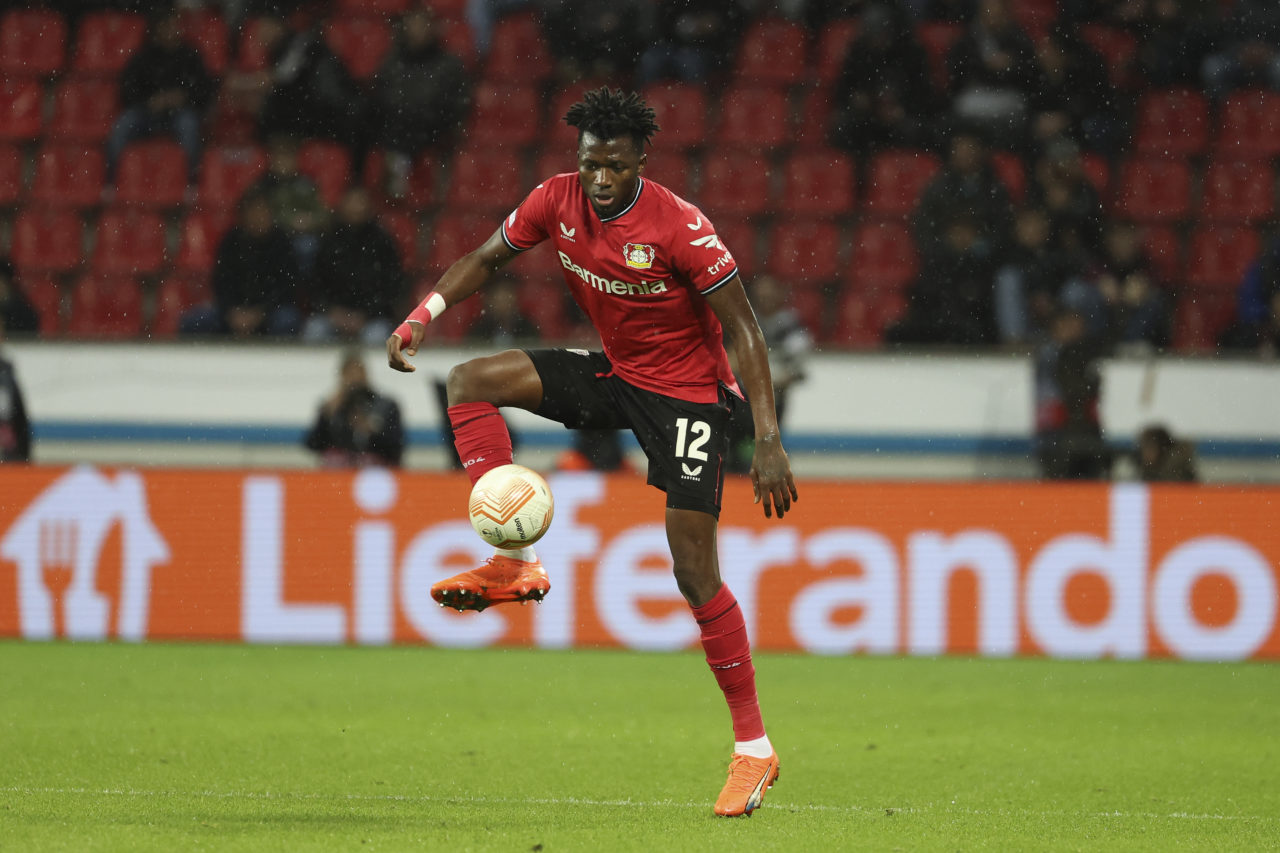 Edmond Tapsoba of Bayer 04 Leverkusen controls the ball