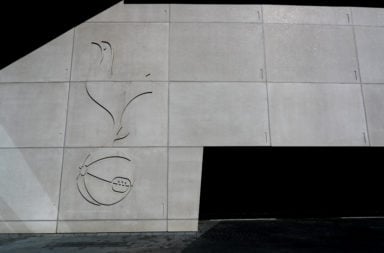 The Tottenham Hotspur badge seen on the side of Tottenham Hotspur Stadium