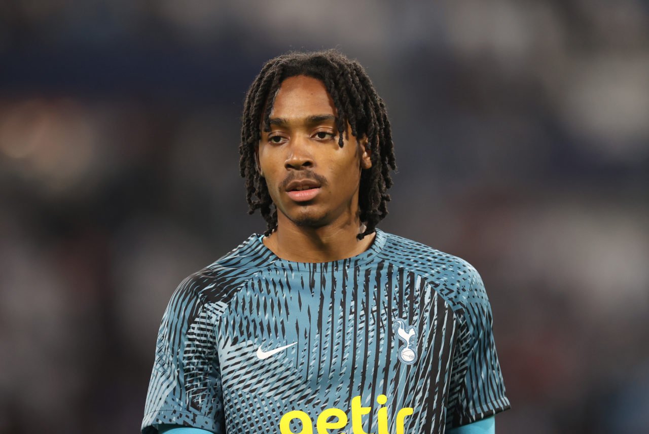 Djed Spence warms up for Tottenham