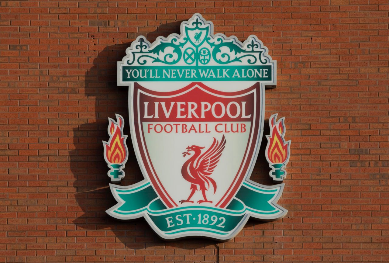 Liverpool FC club badge on a wall outside Anfield