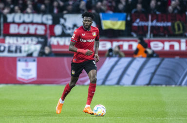 Edmond Tapsoba of Leverkusen runs with the ball